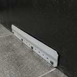 Hybrid vertical stock floor shelf installation bar mounted to wall