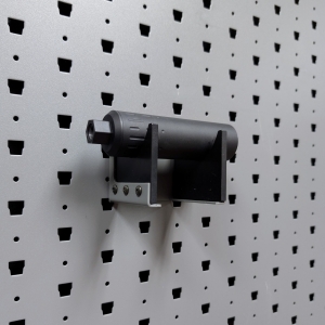 Medium horizontal suppressor hanger holding pistol suppressor left angle view
