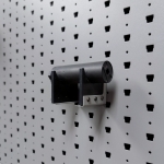 Medium horizontal suppressor hanger holding pistol suppressor right angle view